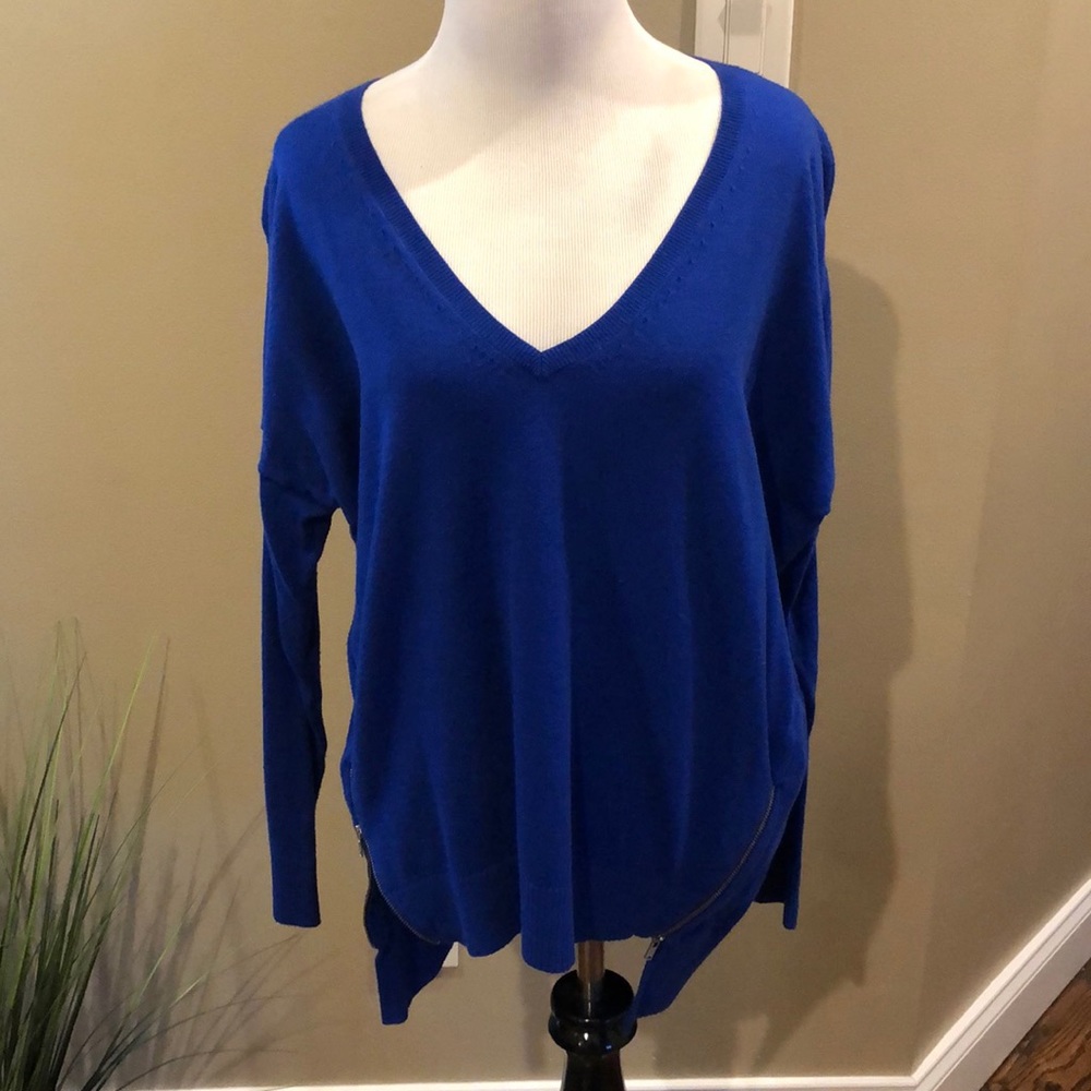 Express. Size small. Royal blue sweater w/ zippers
